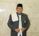 >Hasan Basri Tanjung